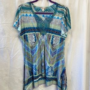 World Unity brand patterned blouse, size women’s medium.